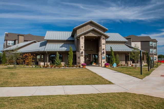 Exterior view of the community building and apartment complex.