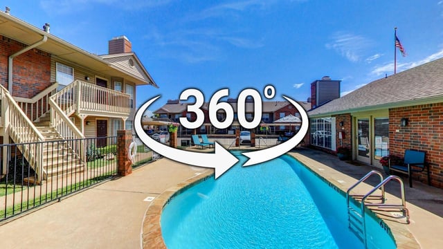 360 virtual tour of a swimming pool and apartment building exterior.