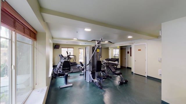 Fitness center with cardio machines and weight training equipment
