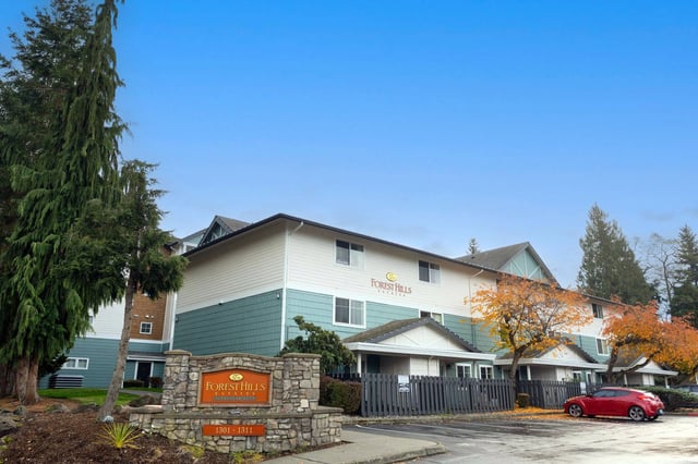 Forest Hills Apartments building exterior with monument signage.