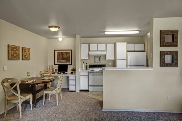 Kitchen and dining area with a desk