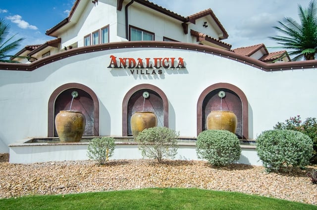 Andalucia Villas monument sign with fountains.