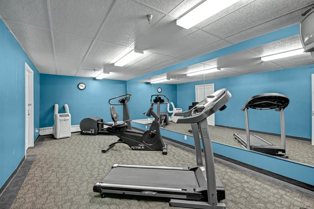 Gym with treadmills and recumbent bikes.