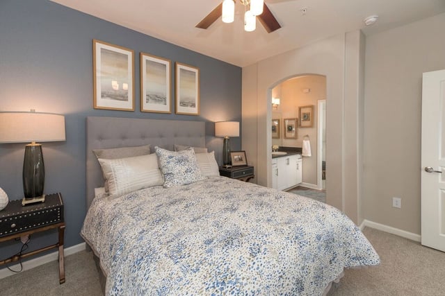 Bedroom with a king-size bed and an ensuite bathroom.