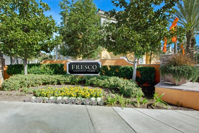 Fresco Apartment Homes monument sign with landscaping