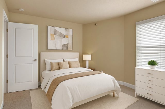 Bedroom with a queen-size bed, nightstand, dresser, and a window.