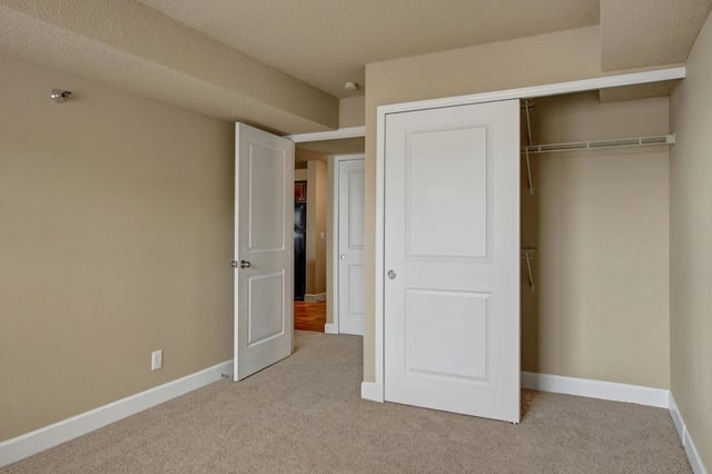 Interior view of an apartment bedroom with closet