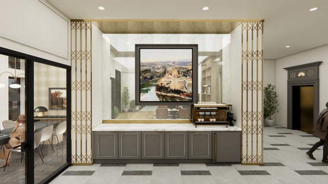 Interior coffee bar and lounge area with a painting and espresso machine.