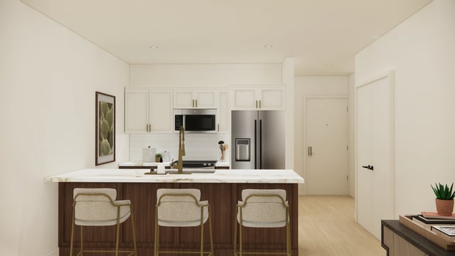 Modern kitchen with island and bar stools.