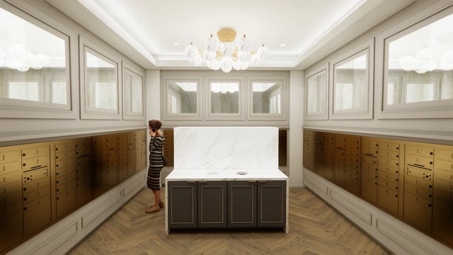 Modern mailroom with brass mailboxes and a woman on the phone.