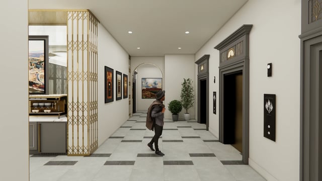 Hallway with elevators, art, and a coffee station.