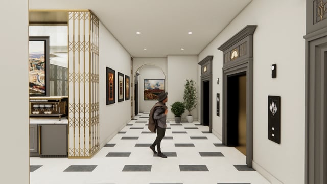 Hallway with elevators and artwork.
