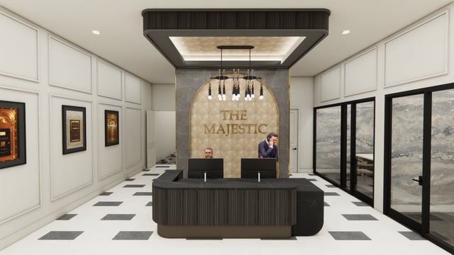 The Majestic apartment building lobby with reception desk and staff.