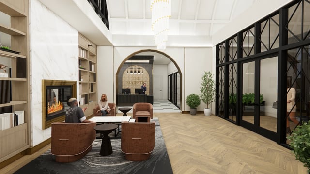 Elegant lobby with seating area, fireplace, and reception desk.
