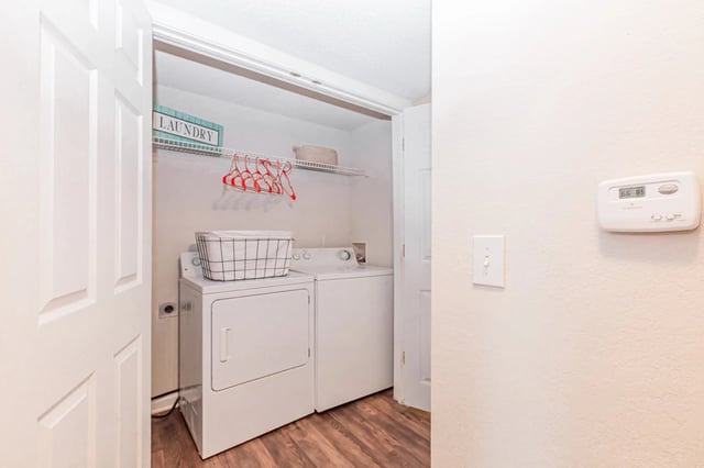 Laundry room with washer and dryer. View 1-bedroom apartments for rent in East Point GA—schedule a tour or call to learn more.