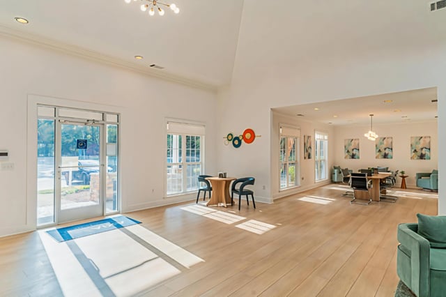Stylish modern lobby with seating areas and artwork.