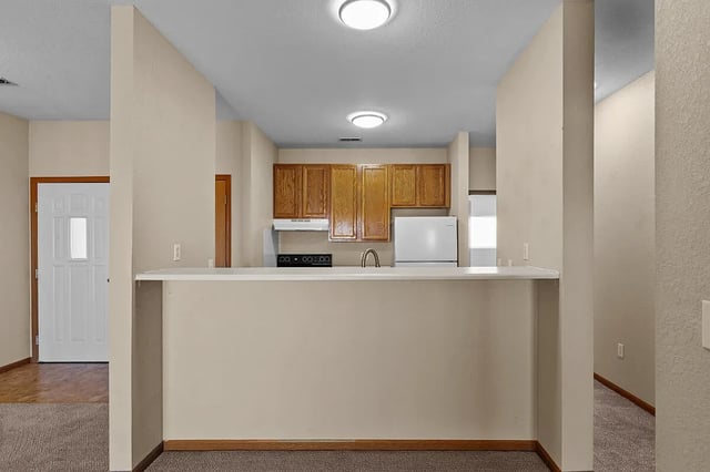 Kitchen and dining area with breakfast bar