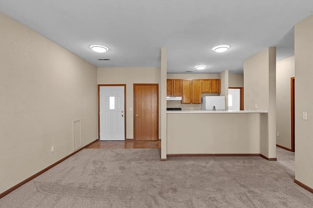 Living area and kitchen with counter seating