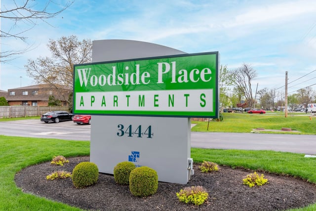 Woodside Place Apartments monument sign with address 3444
