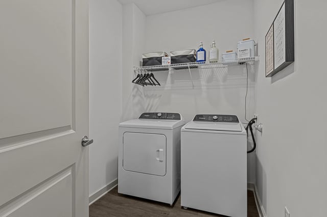 In-unit laundry room with washer and dryer