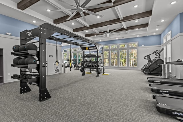 State-of-the-art fitness center with TRX equipment, free weights, treadmills, and stair climbers.